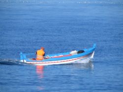 A fisherman in the Mediterranean sea - Canon Powershot S1... by Ferdinando Meli 